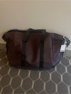 RAINS Dark Cherry Waterproof Weekend Bag